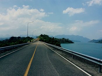 View of road against cloudy sky