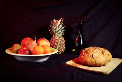 Close-up of fruits in plate on table