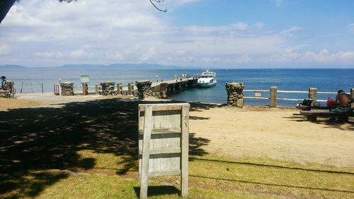 Scenic view of sea against cloudy sky