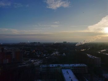 High angle view of townscape against sky at sunset