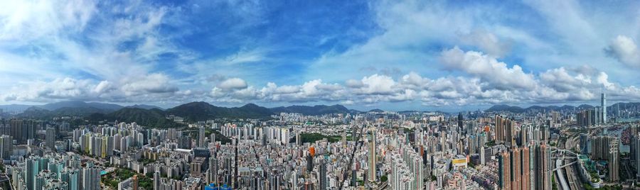 Aerial view of cityscape against sky