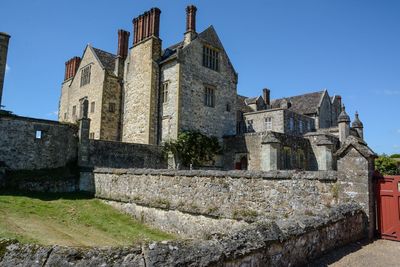 Low angle view of historic building against sky