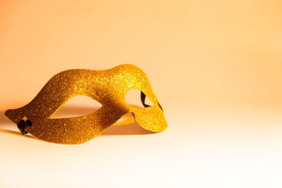 Close-up of toy against yellow background