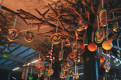 Low angle view of illuminated lanterns hanging in market