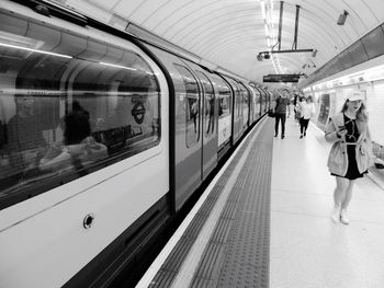People at railroad station platform