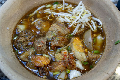 High angle view of soup in bowl on table