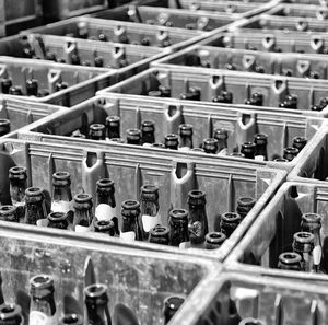 Full frame shot of bottles in crates