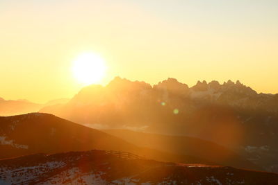 Scenic view of mountains against sky during sunset