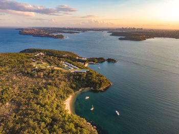 Drone view of quarantine station in sydney harbour. north head, south head and cbd in the back.