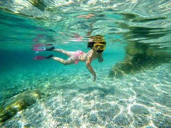 Man swimming in sea