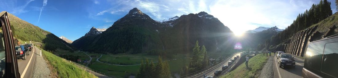 Panoramic view of road amidst mountains against sky