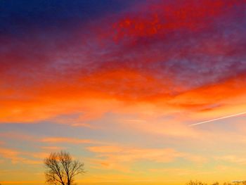 Low angle view of dramatic sky during sunset