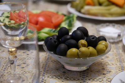 Fruits in bowl on table