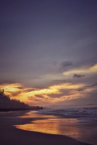 Scenic view of sea at sunset