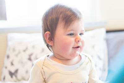 Close-up of cute baby at home