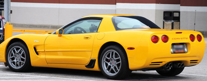 Yellow car on road