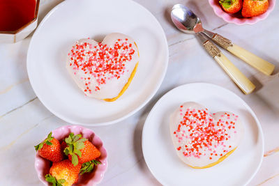 High angle view of fruits in plate on table