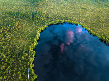 High angle view of lake seen through land