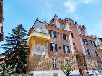 Low angle view of old building against sky