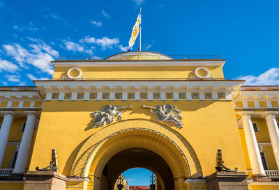 Low angle view of building against blue sky