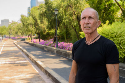Portrait of man in park