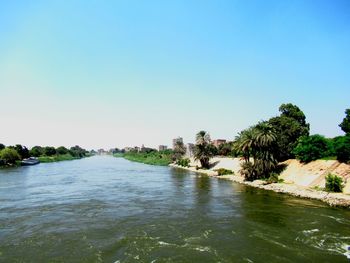 Scenic view of river against clear sky