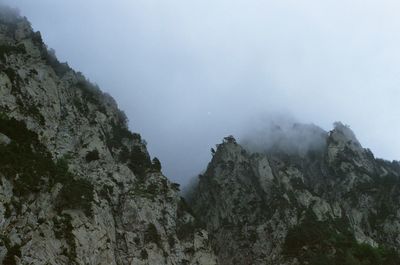 Scenic view of rocky mountains against sky