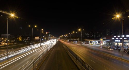 Light trails on road at night