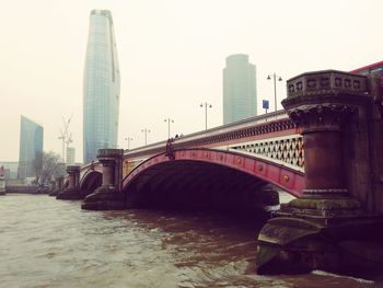 Bridge over river in city