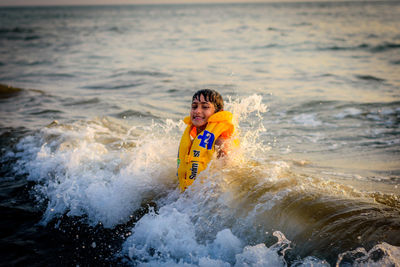 Portrait of boy in sea