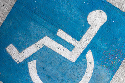 High angle view of disabled sign on street