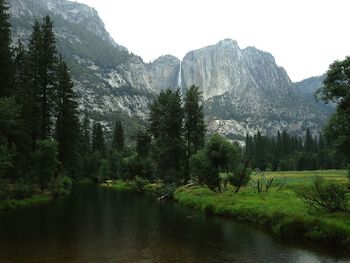 Scenic view of river and mountains