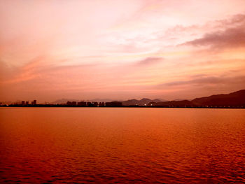 Scenic view of sea against sky during sunset