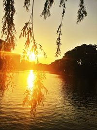 Scenic view of sunset over river
