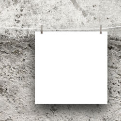 Directly above shot of paper hanging on wall