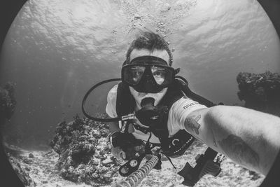 Man swimming in sea