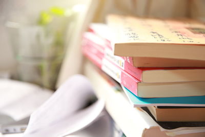 Close-up of stacked books on table