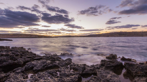 Scenic view of sea against sky during sunset