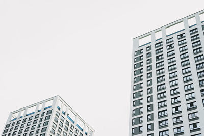 Low angle view of modern building against clear sky