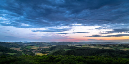 Scenic view of landscape against sky during sunset