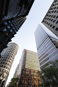 Low angle view of skyscrapers against sky