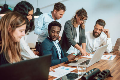 Business colleagues working at office