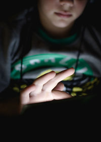 Close-up of boy wearing camera