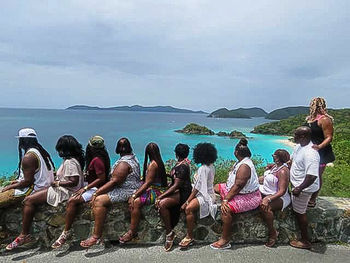 People relaxing at beach