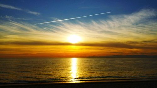 Scenic view of sea at sunset