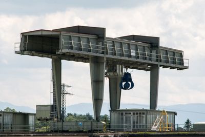 Low angle view of building against cloudy sky