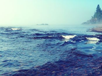 Scenic view of sea against clear sky