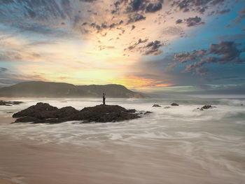 Scenic view of sea against sky during sunset