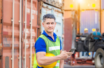 Portrait of man using mobile phone