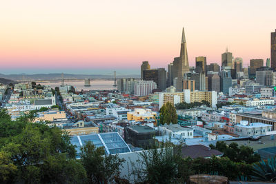 High angle view of buildings against sky during sunset